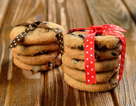 Chocolate chip cookies decorated with ribbonsの写真素材