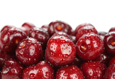 Fresh cherries on a white background, macro photoの写真素材