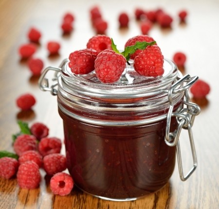 Raspberry jam on a brown table