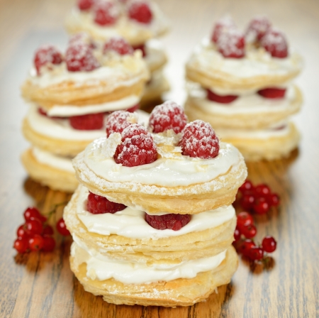 Millefeuille with raspberry  on a brown tableの写真素材