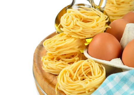 egg noodles on a white backgroundの写真素材