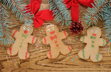 Gingerbread men on a brown background