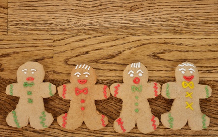 Gingerbread men on a brown background