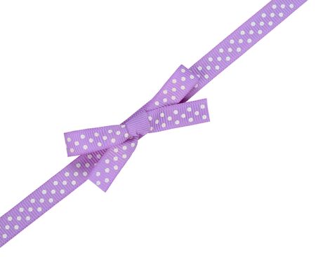 purple ribbon with bow isolated on white backgroundの写真素材