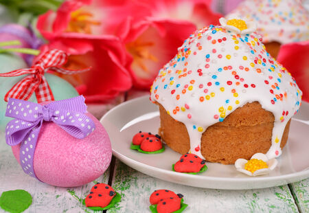 Easter cake and eggs on a white background