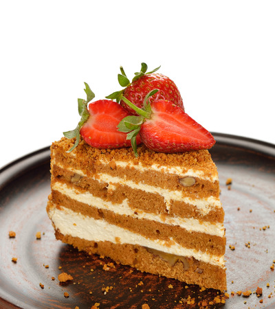 Cake with strawberries on white backgroundの写真素材