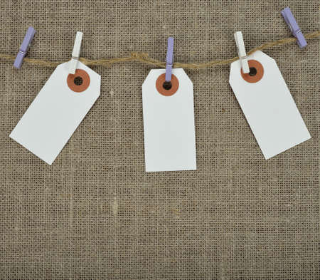 White labels on jute background