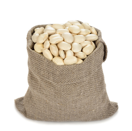 Beans in a bag isolated on white backgroundの写真素材