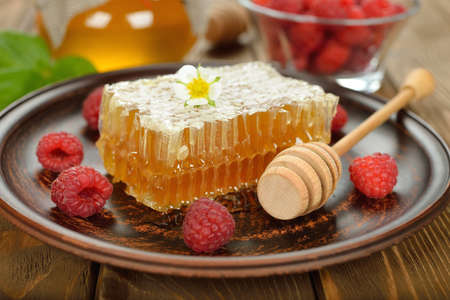 Honey comb on a brown background