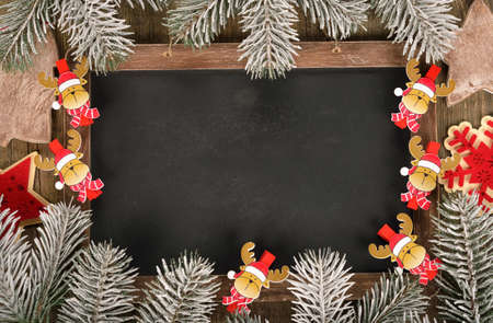 Christmas decorations on a wooden background, top viewの写真素材