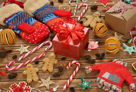 Different Christmas decorations on brown background