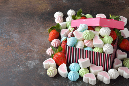 Various festive sweets on brown backgroundの写真素材
