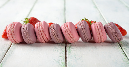 Macaroon with strawberries on a white backgroundの写真素材