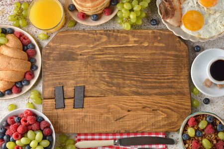 Various breakfasts on a brown backgroundの写真素材