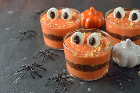 Funny dessert monster for Halloween on a gray backgroundの写真素材