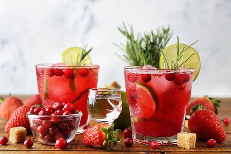 Cranberry cocktail with vodka on a brown background