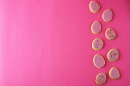 Easter cookies on a pink background