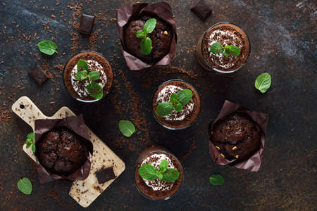 Chocolate dessert and pastries on brown backgroundの写真素材