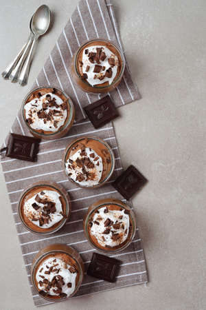 Classic french chocolate mousse on brown background