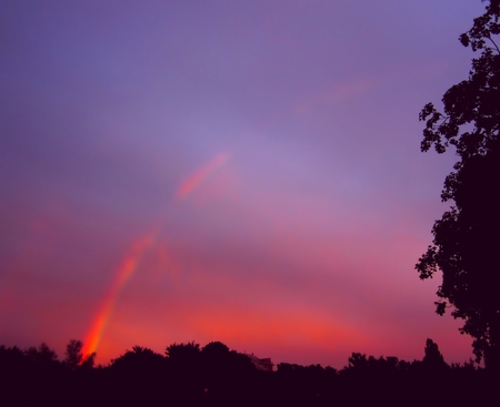 Rainbow six background. Multicolor rainbow on the blue sky with purple sunset.  Abstract pink rainbow sky, sunset today, sunrise and sunset.の写真素材