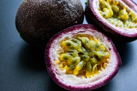 Passion fruit on dark backgroundの写真素材