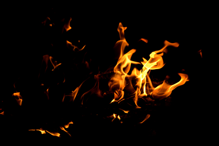Fire flames on dark backgroundの写真素材