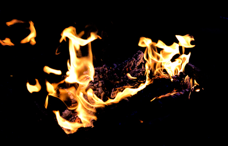Fire flames on dark backgroundの写真素材
