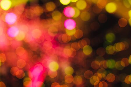 Twinkly Lights and Stars Christmas Background. Colored abstract blurred light background layout...