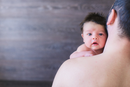 Newborn baby and dadの写真素材