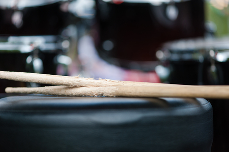 Close up of wooden drumsticks close up at chairの写真素材