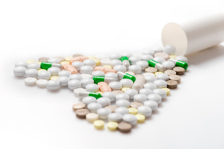 Pills mix in a heart shape.の写真素材