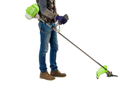 Man with garden trimmer isolated on white background.の写真素材