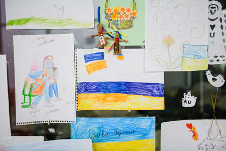 Dnipro, Ukraine - April 04, 2022: Many children's drawings about the war in Ukraine. Refugee Assistance Center in Dnipro.のeditorial素材