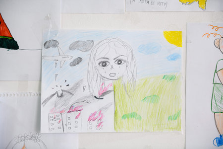Dnipro, Ukraine - April 04, 2022: Children's drawing about the war in Ukraine. Refugee Assistance Center in Dnipro.のeditorial素材