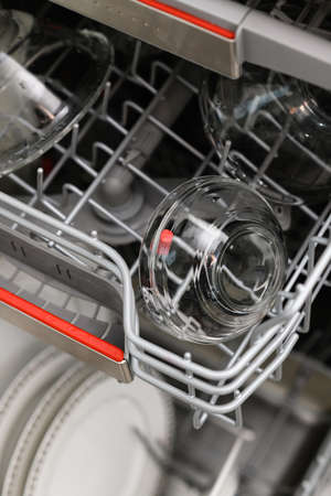 Clean dishes in the dishwasher close-up. top view.の写真素材