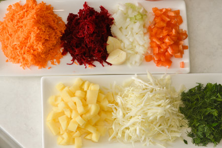 Chopped vegetables for cooking traditional Ukrainian borscht. View from above.の写真素材