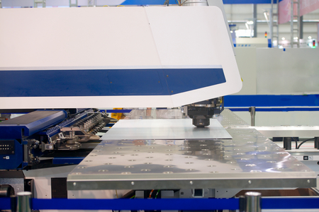High precision CNC sheet metal stamping and punching machinery on exhibitionの写真素材