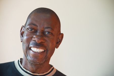 Portrait of an elderly African cheerful menの写真素材