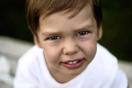 Close up portrait of handsome boy outdoors