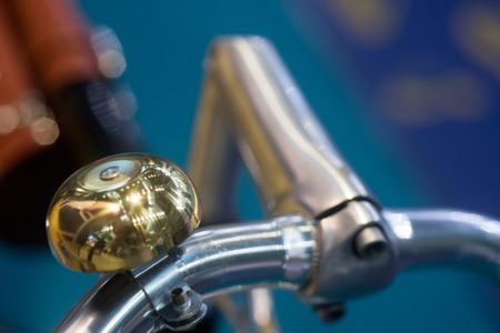 Bicycle handlebar and old type bell background photoの写真素材