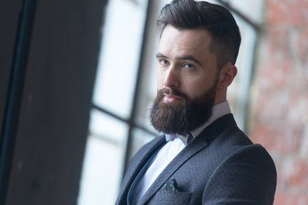 Portrait of a young bearded groom on the eve of the wedding, theの写真素材