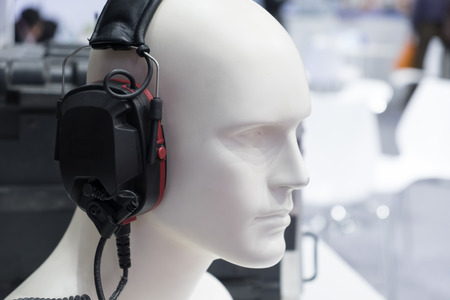 White Head of dummy with  headphones on exhibitionの写真素材