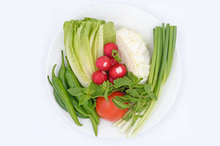 Lebanese kibbeh with mint leaves and tomato wedgeの写真素材