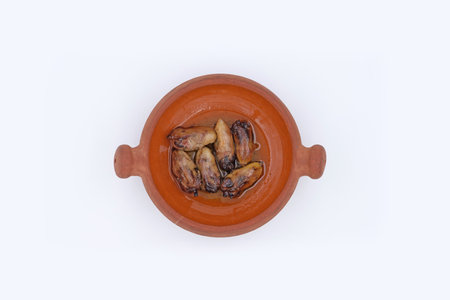 Fried birds in pottery bowl Lebanese cuisineの写真素材