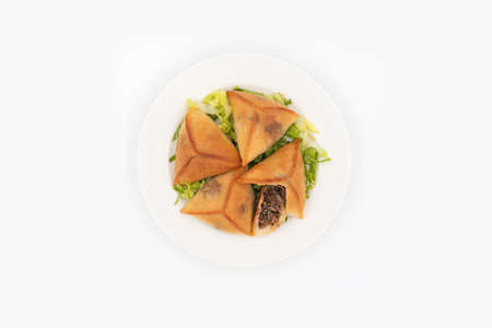 Lebanese puff pastry fatayer with herbs and onions