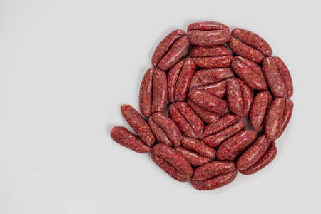 Ring Raw homemade sausages close-up isolate on a white backgroundの写真素材