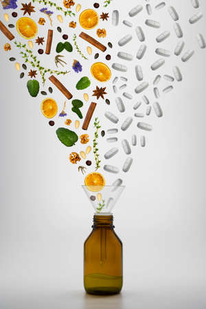 Herbal medicine vs chemical medicine  white  background - drugs vs herbalの写真素材