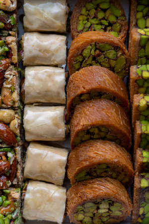 Arabic and Turkish oriental sweets Desserts made of pistachios and kunafa with leafy doughの写真素材