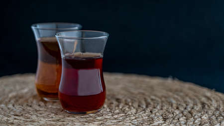 Turkish tea on circular straw base.の写真素材