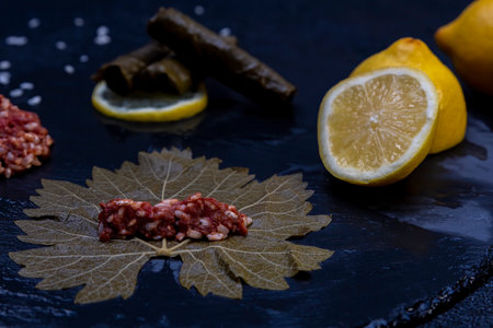 Stuffed grape leaves with the ingredients for thai cooking ,the leaves of the grapevine plant, are...